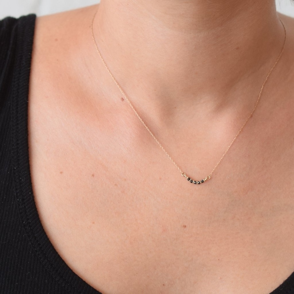 14KT GOLD BLACK DIAMOND CURVE PENDANT